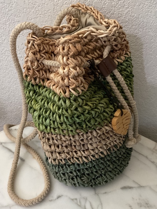 Hand crafted drawstring back pack,artisan style,raffia material,wood leaf charm main image 6